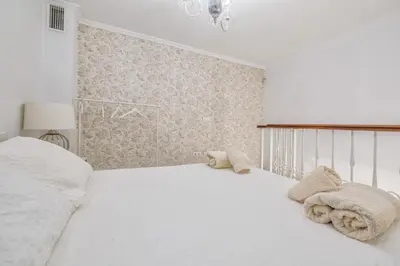 Cama o camas de una habitación en Duplex La Almazara en el centro histórico de Córdoba