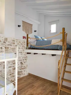 Cama o camas de una habitación en LA CASA DE LA HUERTA Stylish family cottage in Malaga countryside