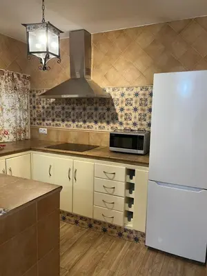 Una cocina o zona de cocina en El Torreón 3