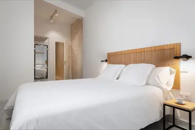 Cama o camas de una habitación en Magno Apartments San Gil - Shared Jacuzzi