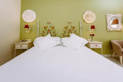 Cama o camas de una habitación en Basic Hotel Doña Manuela