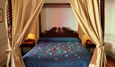 Cama o camas de una habitación en Hotel Mirador de Llerena