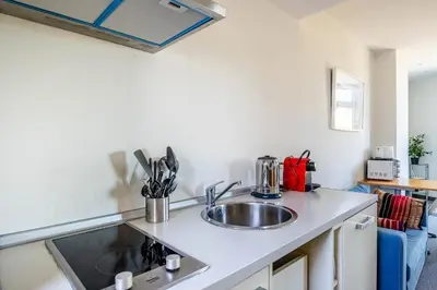 Una cocina o zona de cocina en Casa Xanadu Carmona - Stylish villa with rooftop terrace and stunning views of Parador