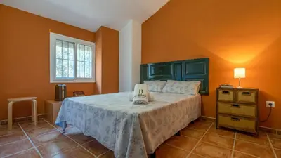 Cama o camas de una habitación en Casa Ginés Iznájar by Ruralidays