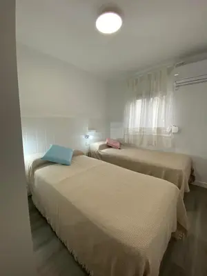 Cama o camas de una habitación en piso junto al hospital macarena