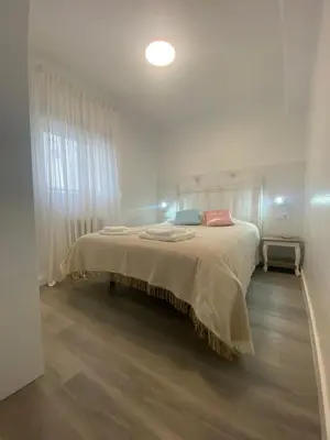 Cama o camas de una habitación en piso junto al hospital macarena