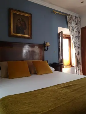 Cama o camas de una habitación en Hotel Boutique La Llave de la Judería