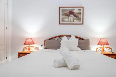 Cama o camas de una habitación en Alejo Fernandez Dreams de Santa Cruz Oasis Sevilla