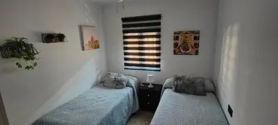 Cama o camas de una habitación en Cuadro de la Virgen - Vivienda Turistica