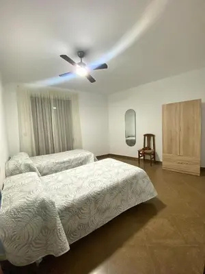 Cama o camas de una habitación en Casa Cruz de Marbella Luque