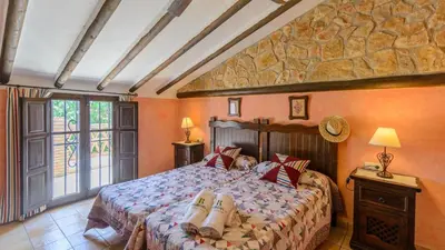 Cama o camas de una habitación en Combinación Cortijo y Mirador Casablanca Priego de Córdoba by Ruralidays