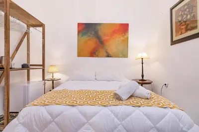 Cama o camas de una habitación en Judería Suites