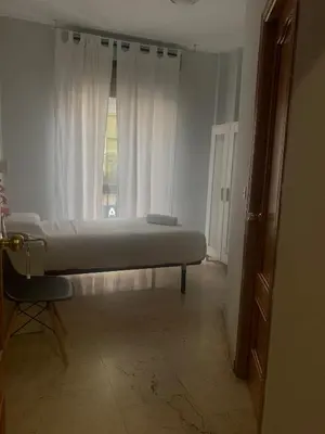 Cama o camas de una habitación en Hotel Gran Plaza
