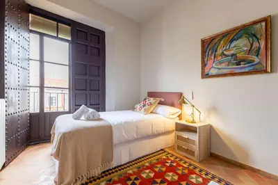 Cama o camas de una habitación en Ohliving La Judería