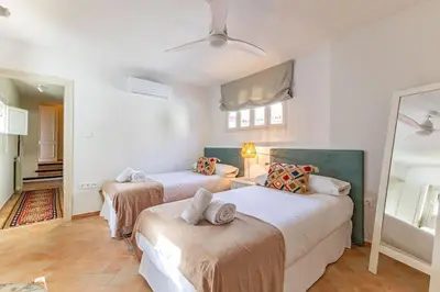 Cama o camas de una habitación en Ohliving La Judería