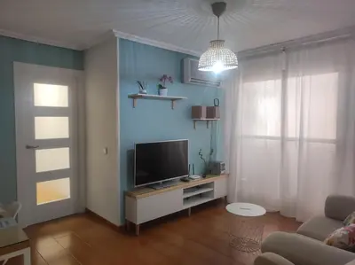 Una televisión o centro de entretenimiento en Alojamiento La Paz