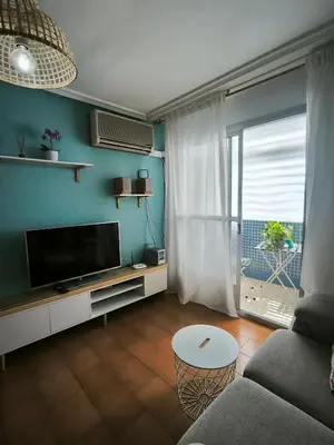 Una televisión o centro de entretenimiento en Alojamiento La Paz
