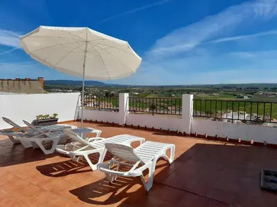Un balcón o terraza de Lonja del Ribacillo, Casa Rural