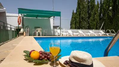 Piscina en o cerca de Cortijo el Cortijuelo Villanueva de Algaidas by Ruralidays
