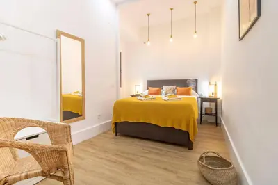 Cama o camas de una habitación en Appartement Neuf avec Rooftop 69 M2 - STAYINSEVILLE
