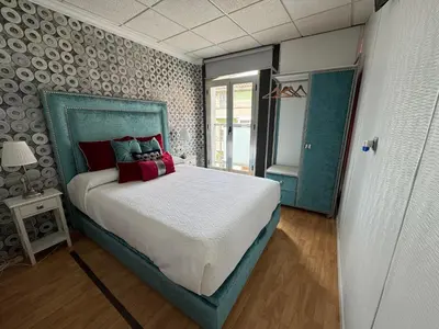 Cama o camas de una habitación en GRAN CASTRAVINARIA