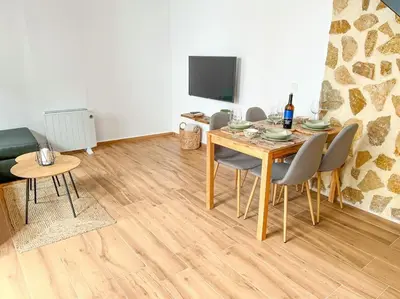 Una televisión o centro de entretenimiento en Casa La Buganvilla