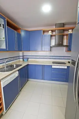 Una cocina o zona de cocina en Sevilla Clásica: amigos y familia. Parking gratis!
