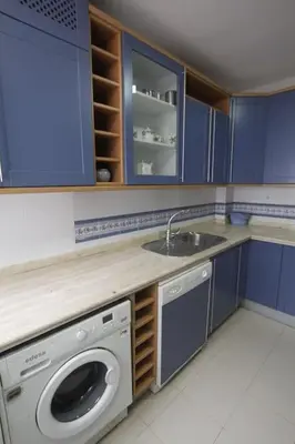 Una cocina o zona de cocina en Sevilla Clásica: amigos y familia. Parking gratis!