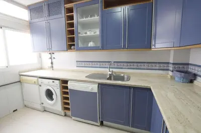Una cocina o zona de cocina en Sevilla Clásica: amigos y familia. Parking gratis!