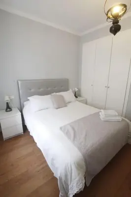 Cama o camas de una habitación en Sevilla Clásica: amigos y familia. Parking gratis!