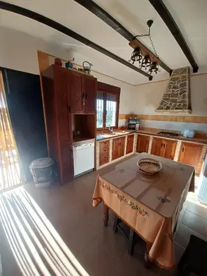 Una cocina o zona de cocina en VILLA MARTINEZ ALQUILER RURAL ISABEL