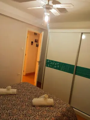 Cama o camas de una habitación en Barrio Macarena - Gardenia