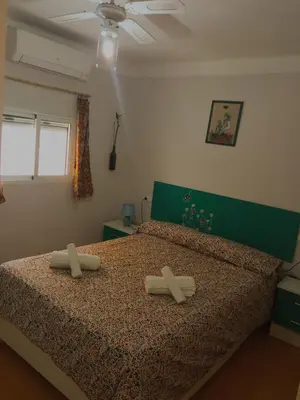 Cama o camas de una habitación en Barrio Macarena - Gardenia