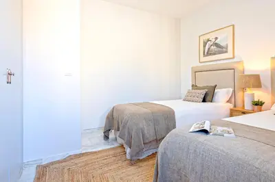Cama o camas de una habitación en Genteel Home Claudio Marcelo