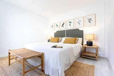 Cama o camas de una habitación en Genteel Home Claudio Marcelo