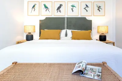 Cama o camas de una habitación en Genteel Home Claudio Marcelo