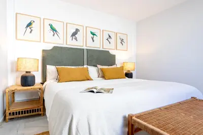 Cama o camas de una habitación en Genteel Home Claudio Marcelo