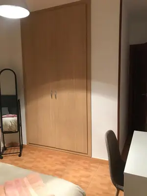Cama o camas de una habitación en Vivienda con fines turísticos ALMA