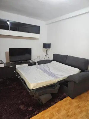 Una televisión o centro de entretenimiento en Vivienda con fines turísticos ALMA