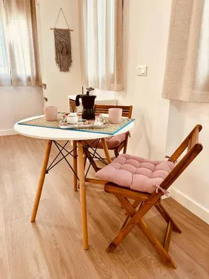 Zona de estar de Coqueto apartamento céntrico con piscina