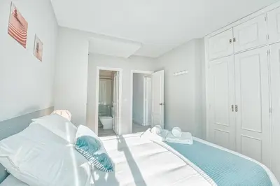 Cama o camas de una habitación en Apartamento New Folch Sevilla B