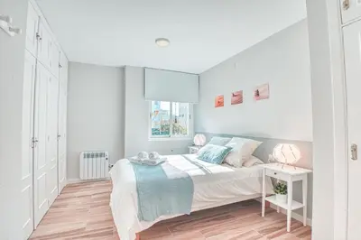 Cama o camas de una habitación en Apartamento New Folch Sevilla B