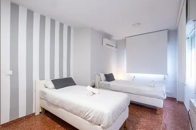 Cama o camas de una habitación en Apartamento New Folch Sevilla A
