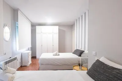 Cama o camas de una habitación en Apartamento New Folch Sevilla A