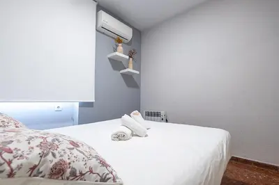 Cama o camas de una habitación en Apartamento New Folch Sevilla A