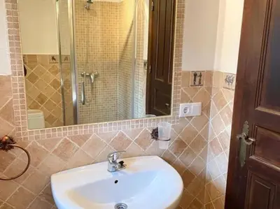 Un baño de Geysotur Buhardilla de Wallada Córdoba