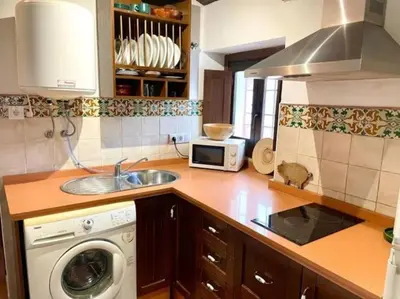 Una cocina o zona de cocina en Geysotur Buhardilla de Wallada Córdoba