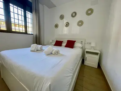 Cama o camas de una habitación en Geysotur Puerta de la Axerquía Parking Gratis