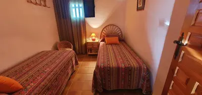 Cama o camas de una habitación en Huerta Carrión, Finca en El Pedroso