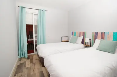 Cama o camas de una habitación en Apartamento Ponce de León junto estación